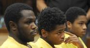 Defendants Drequone Lamar Rich, left, Jasin Reno Curtis, and Dionte Darryl Travis